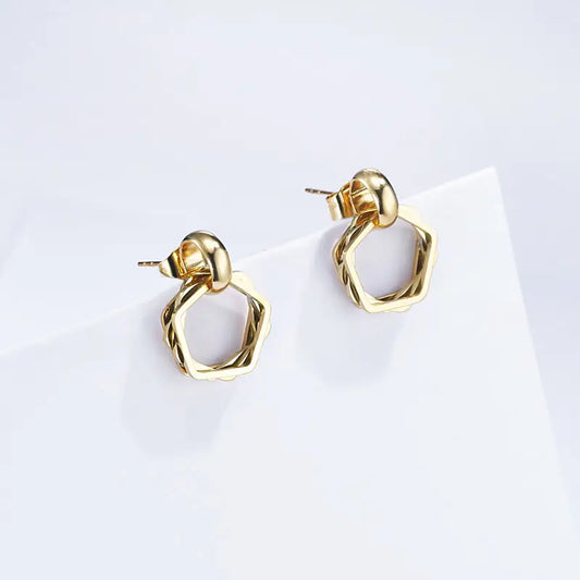 Øredobber i gull med hengende design